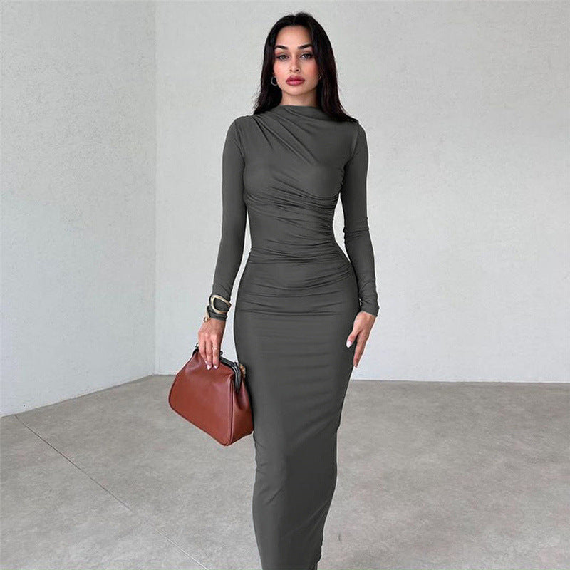 A stylish Autumn Winter women's dress featuring a round neck, long sleeves, and a slim fit design in solid color, perfect for daily wear.