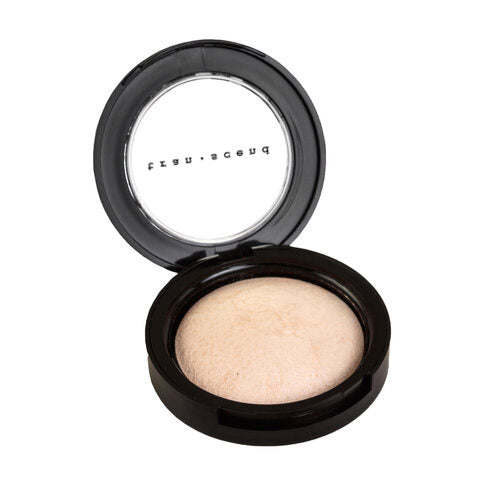 Baked Mineral Highlight in three shades: iridescent rose gold, shimmery champagne gold, and shimmery bronze, displayed in a dome shape.