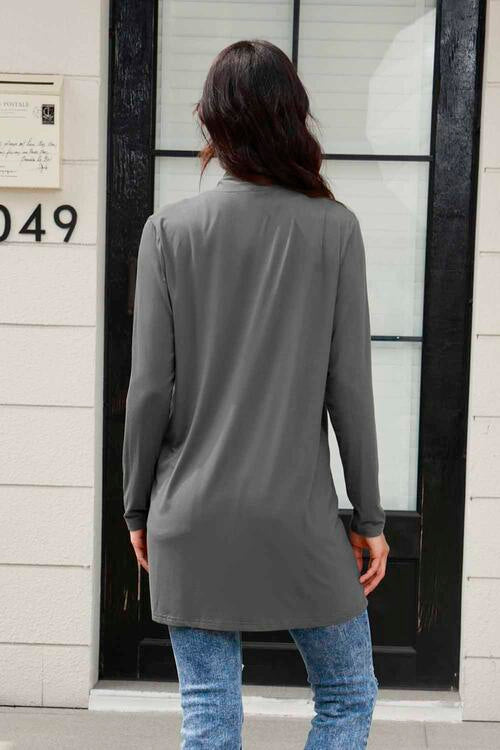 Basic Bae Full Size Open Front Long Sleeve Cardigan with Pockets in a stylish design, showcasing its open front and pockets.
