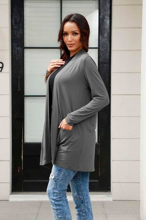 Basic Bae Full Size Open Front Long Sleeve Cardigan with Pockets in a stylish design, showcasing its open front and pockets.