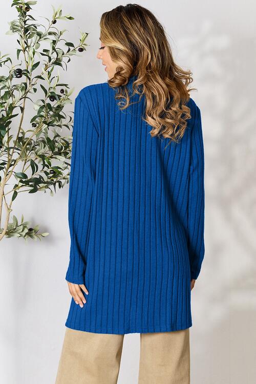 Basic Bae Full Size Ribbed Open Front Cardigan in a stylish ribbed design with pockets, showcasing its comfortable fit and versatile style.