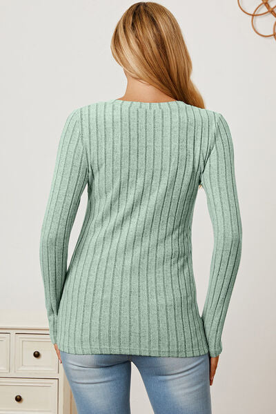 Basic Bae Full Size Ribbed V-Neck Long Sleeve T-Shirt in various sizes, showcasing its ribbed texture and V-neck design.