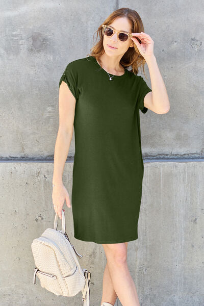 Basic Bae Full Size Round Neck Short Sleeve Dress in a solid color with pockets, showcasing its casual style and comfortable fit.