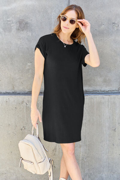 Basic Bae Full Size Round Neck Short Sleeve Dress in a solid color with pockets, showcasing its casual style and comfortable fit.