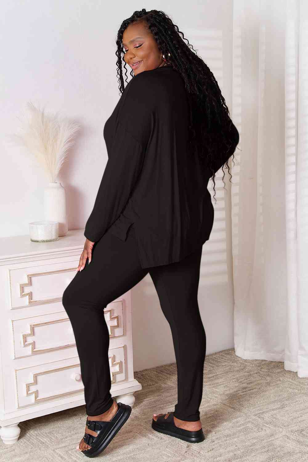 Basic Bae Full Size V-Neck Soft Rayon Long Sleeve Top and Pants Lounge set displayed on a model, showcasing its stylish design and comfortable fit.