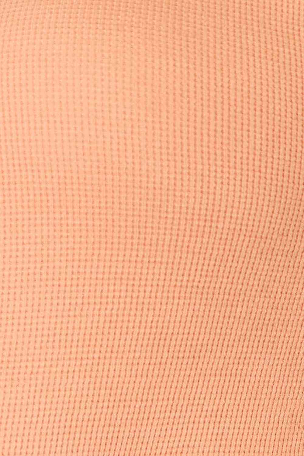 Basic Bae Half Button Long Sleeve Top in a chic design, featuring a half-button front and long sleeves, perfect for versatile styling.