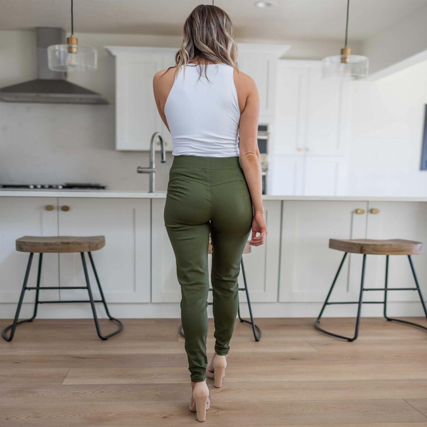 Basic Skinny Pants in various dark and warm colors, showcasing a high-waist design and tapered hem.