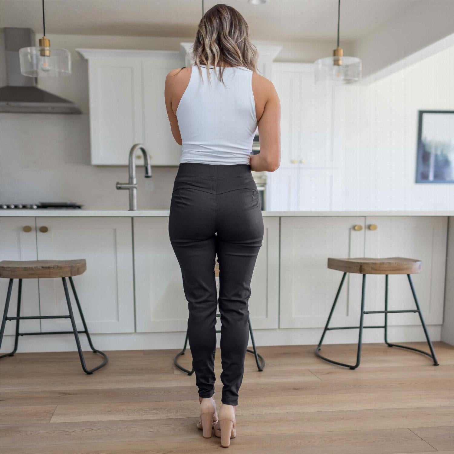 Basic Skinny Pants in various dark and warm colors, showcasing a high-waist design and tapered hem.