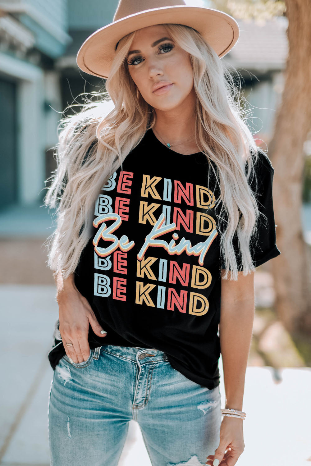BE KIND Graphic Short Sleeve Tee featuring a round neck and short sleeves, made from a soft polyester and spandex blend with a vibrant graphic design.