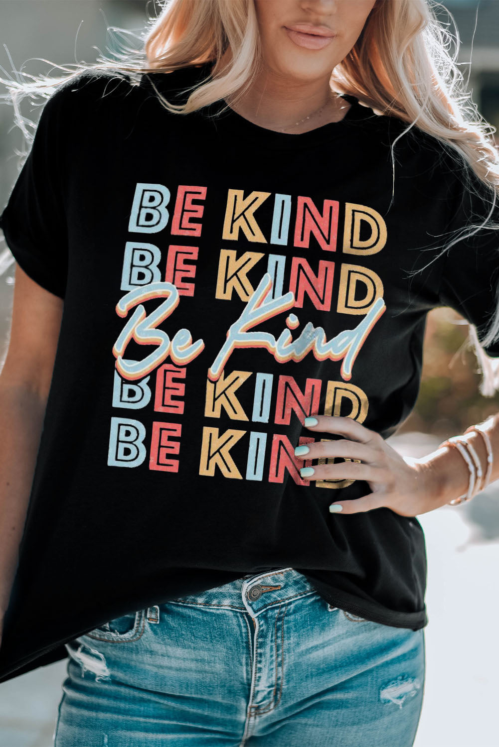 BE KIND Graphic Short Sleeve Tee featuring a round neck and short sleeves, made from a soft polyester and spandex blend with a vibrant graphic design.
