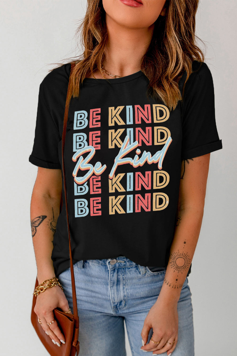 BE KIND Graphic Short Sleeve Tee featuring a round neck and short sleeves, made from a soft polyester and spandex blend with a vibrant graphic design.