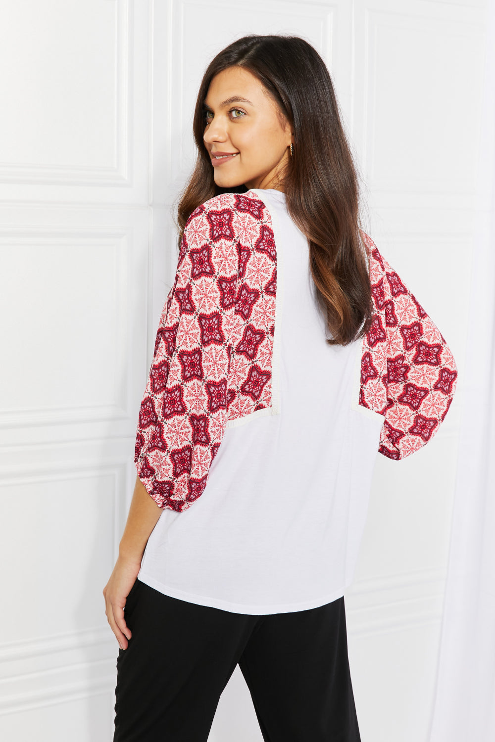Begin Again Printed Sleeve Top featuring balloon sleeves and contrasting patterns, perfect for casual spring outfits.