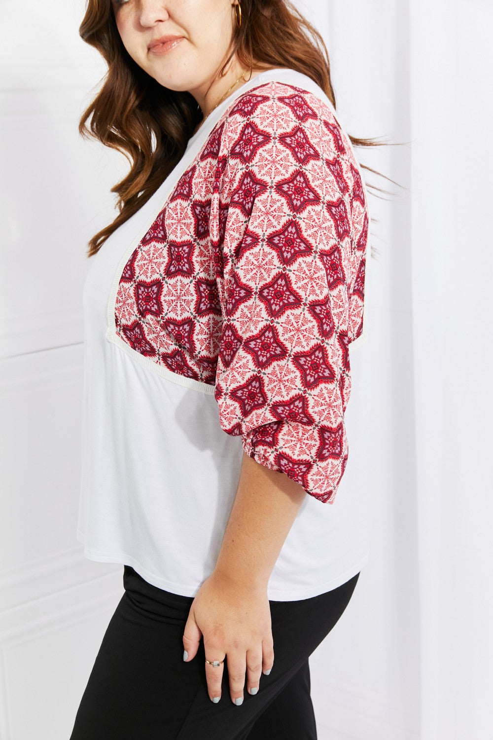 Begin Again Printed Sleeve Top featuring balloon sleeves and contrasting patterns, perfect for casual spring outfits.