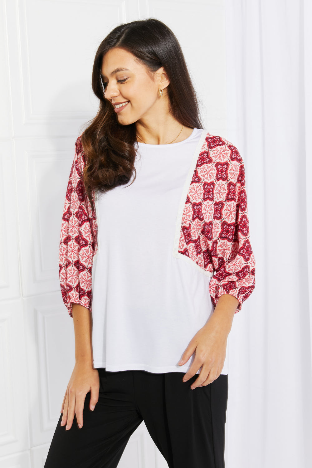 Begin Again Printed Sleeve Top featuring balloon sleeves and contrasting patterns, perfect for casual spring outfits.