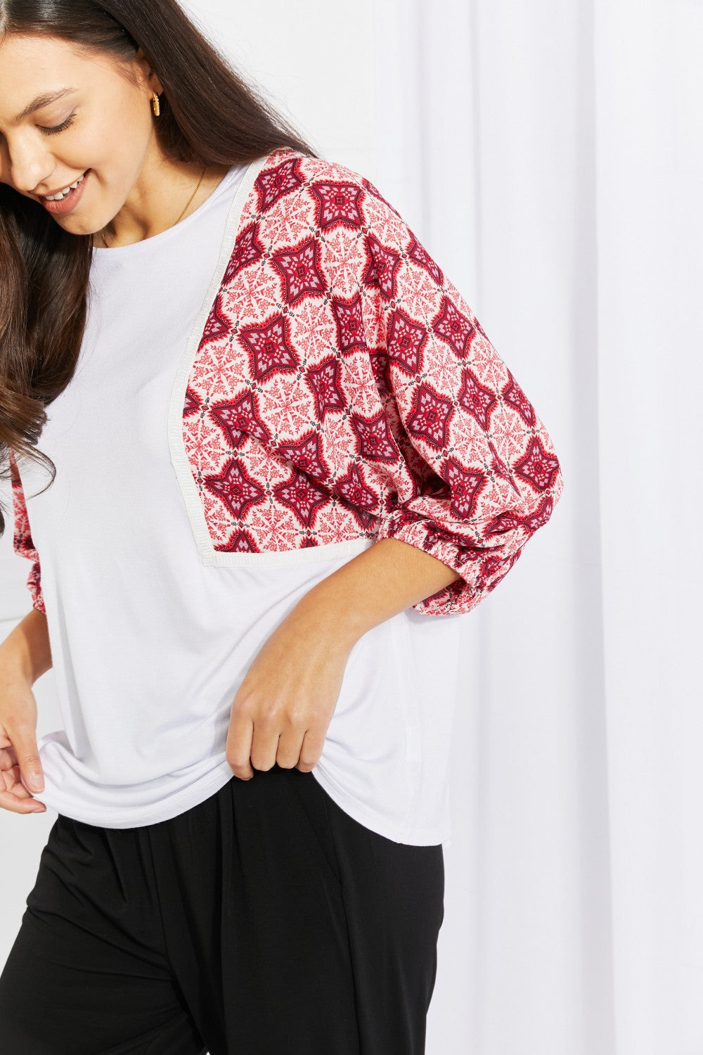 Begin Again Printed Sleeve Top featuring balloon sleeves and contrasting patterns, perfect for casual spring outfits.