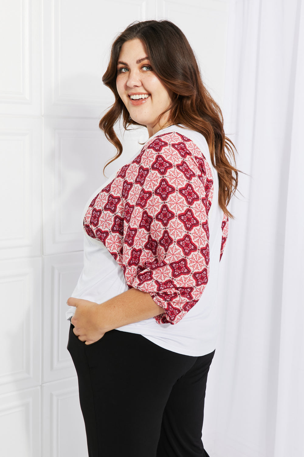 Begin Again Printed Sleeve Top featuring balloon sleeves and contrasting patterns, perfect for casual spring outfits.