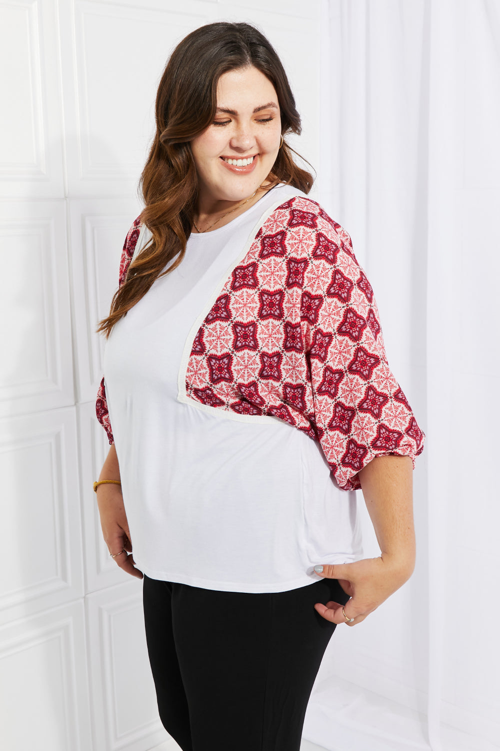 Begin Again Printed Sleeve Top featuring balloon sleeves and contrasting patterns, perfect for casual spring outfits.