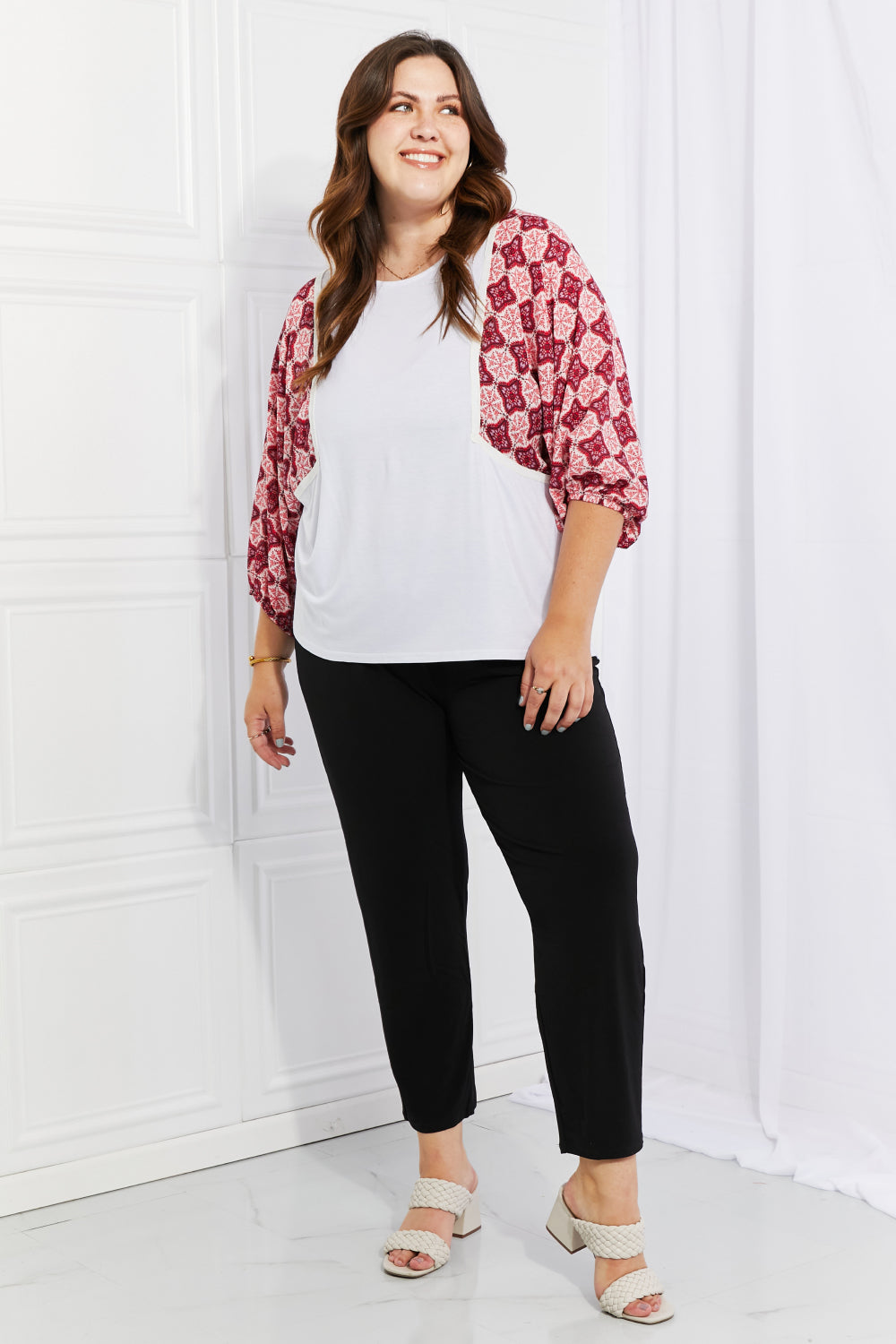 Begin Again Printed Sleeve Top featuring balloon sleeves and contrasting patterns, perfect for casual spring outfits.