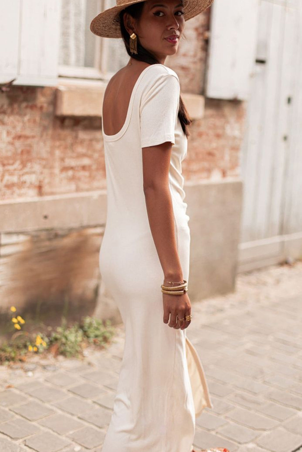 Beige V Neck Ruched Button Front French T-shirt Dress displayed on a mannequin, showcasing its elegant design and soft fabric.