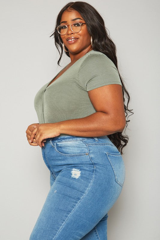 Bellatrix Surplus Bodysuit in Plus featuring a V-neck and front wrap detail, designed for comfort and style.