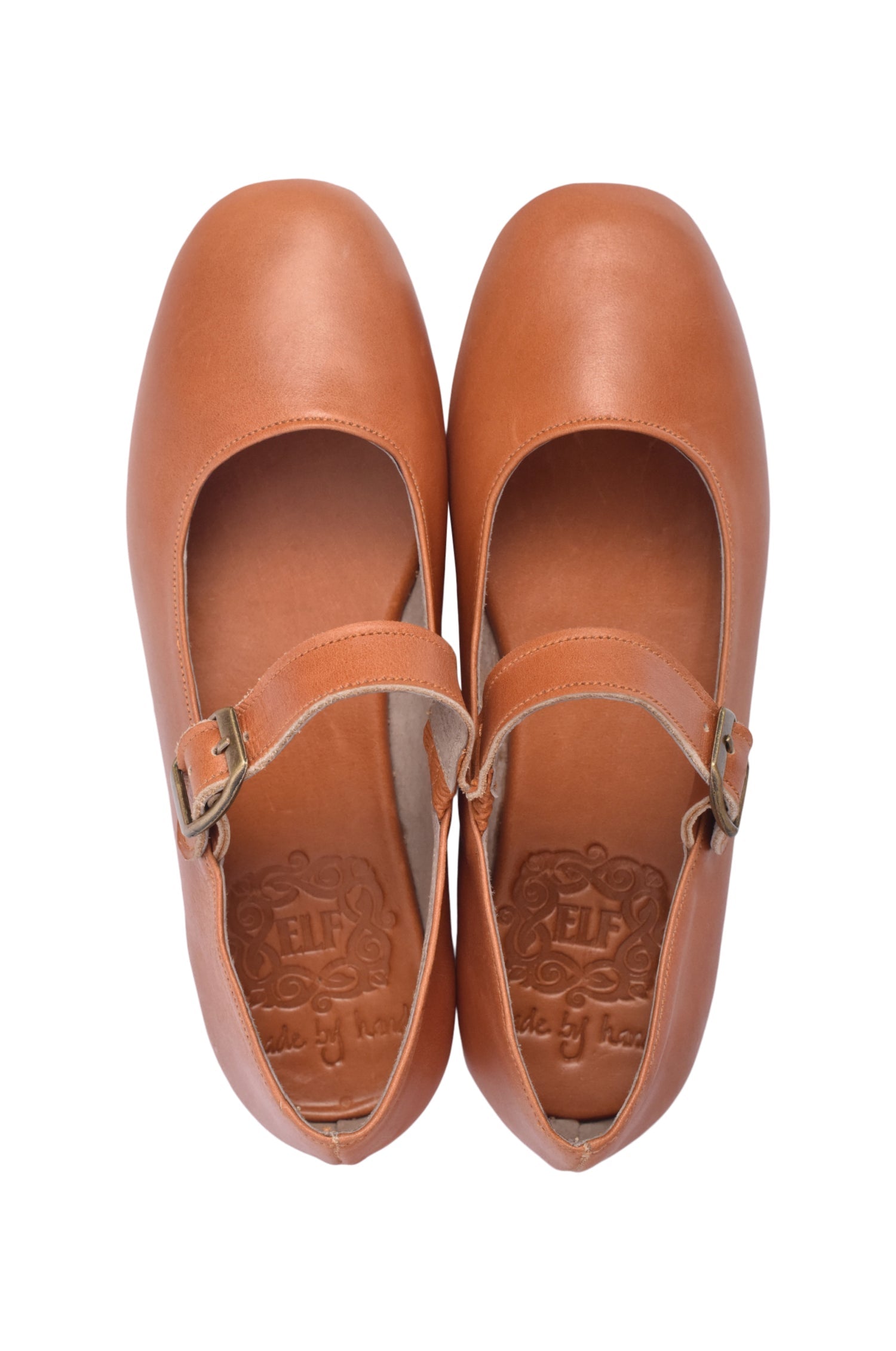 Belle Rose Round Toe Leather Flats in supple leather with adjustable buckle strap, showcasing a classic round toe design.