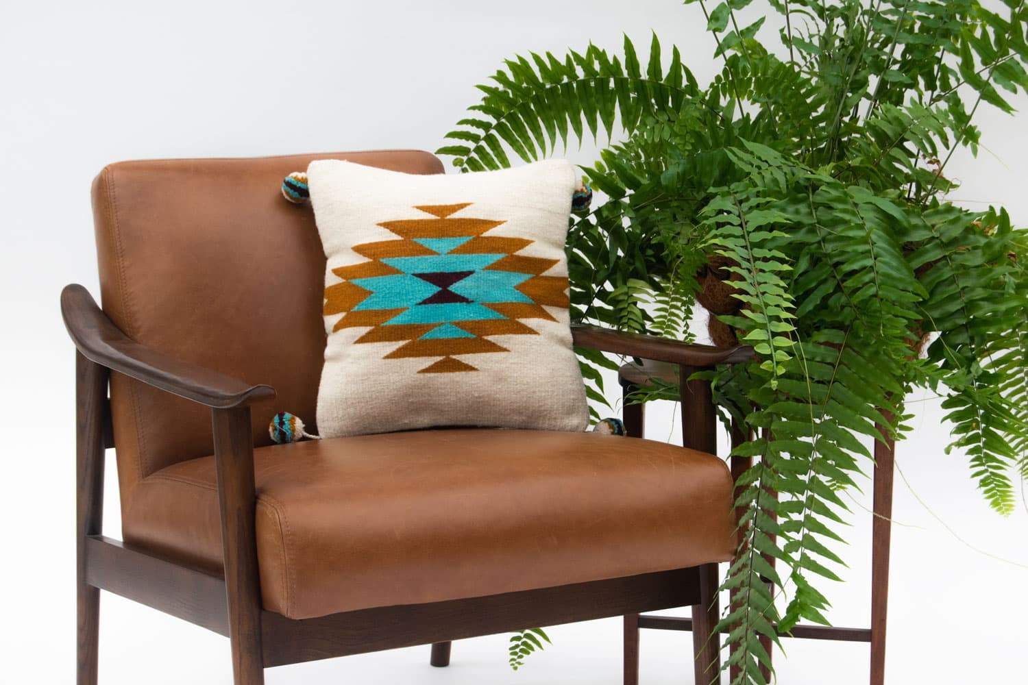 Belegui Flat Weaved Pillow Cover featuring a geometric blue diamond design on a white background, handcrafted from wool and cotton.