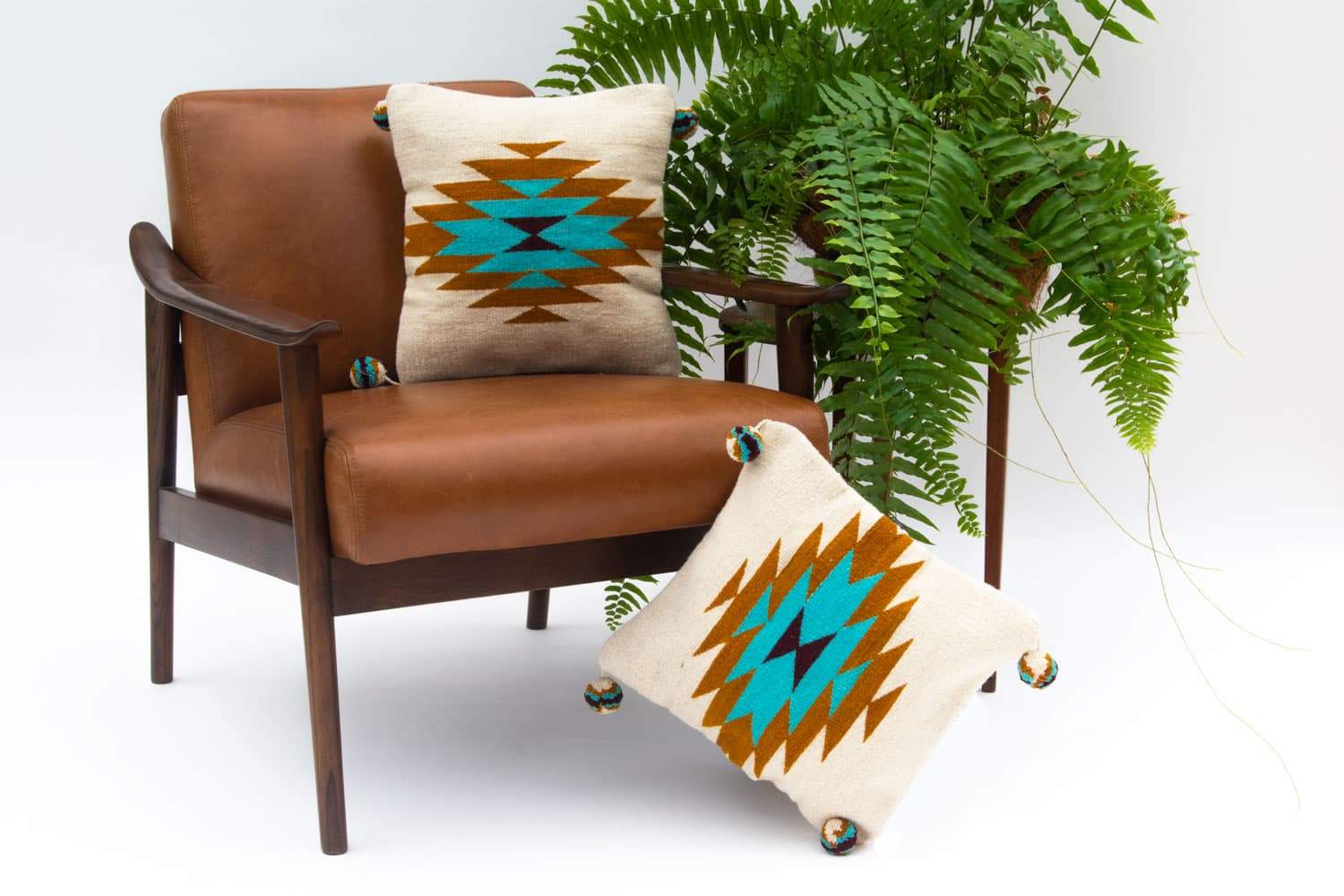 Belegui Flat Weaved Pillow Cover featuring a geometric blue diamond design on a white background, handcrafted from wool and cotton.