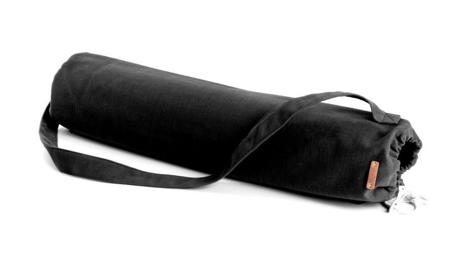 Bibi Because Shopping Cures Me yoga mat featuring a stylish design and textured black back for grip, with a black carrying bag.