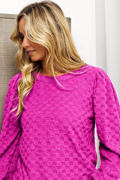 BiBi Round Neck Brushed Checker Top featuring a cozy brushed checker pattern, round neck design, and soft fabric for comfort.