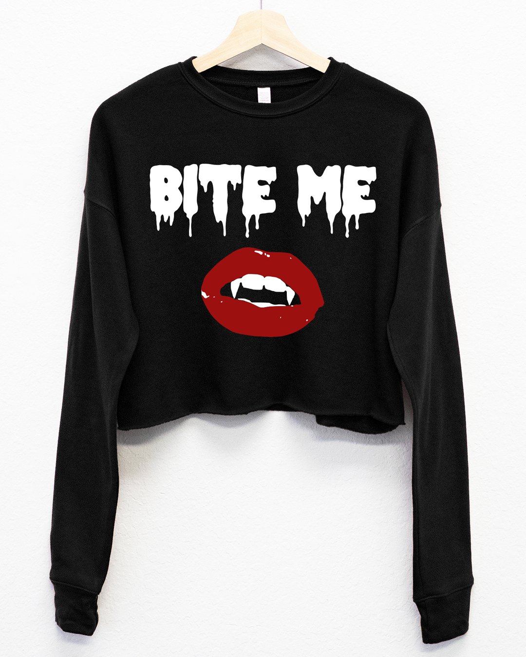 Bite Me Vampire Lips Fleece Cropped Sweatshirt featuring a bold vampire lips design and 'BITE ME' text, perfect for Halloween.