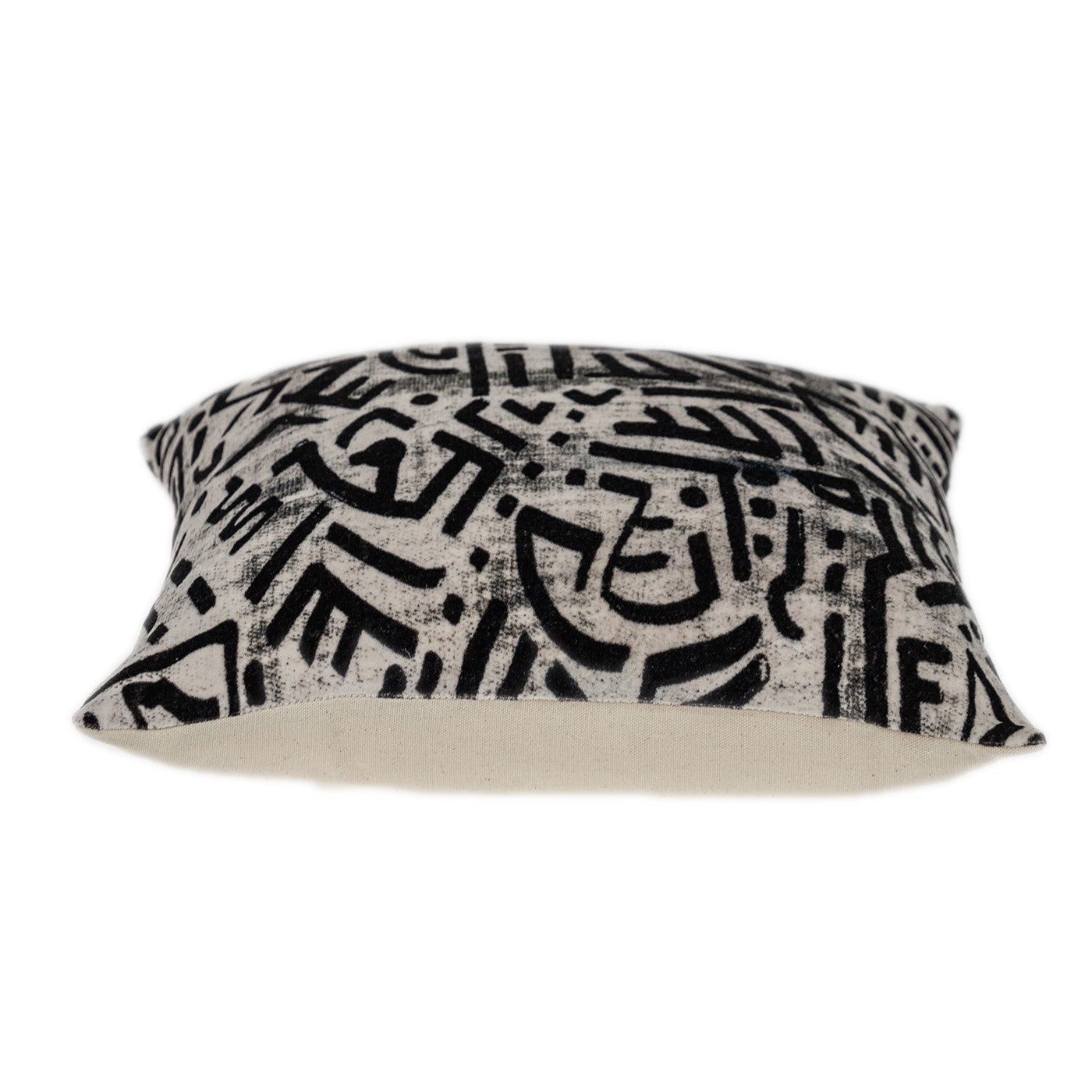 Black and white abstract velvet throw pillow with a modern design, featuring a soft velvet front and beige cotton canvas back.