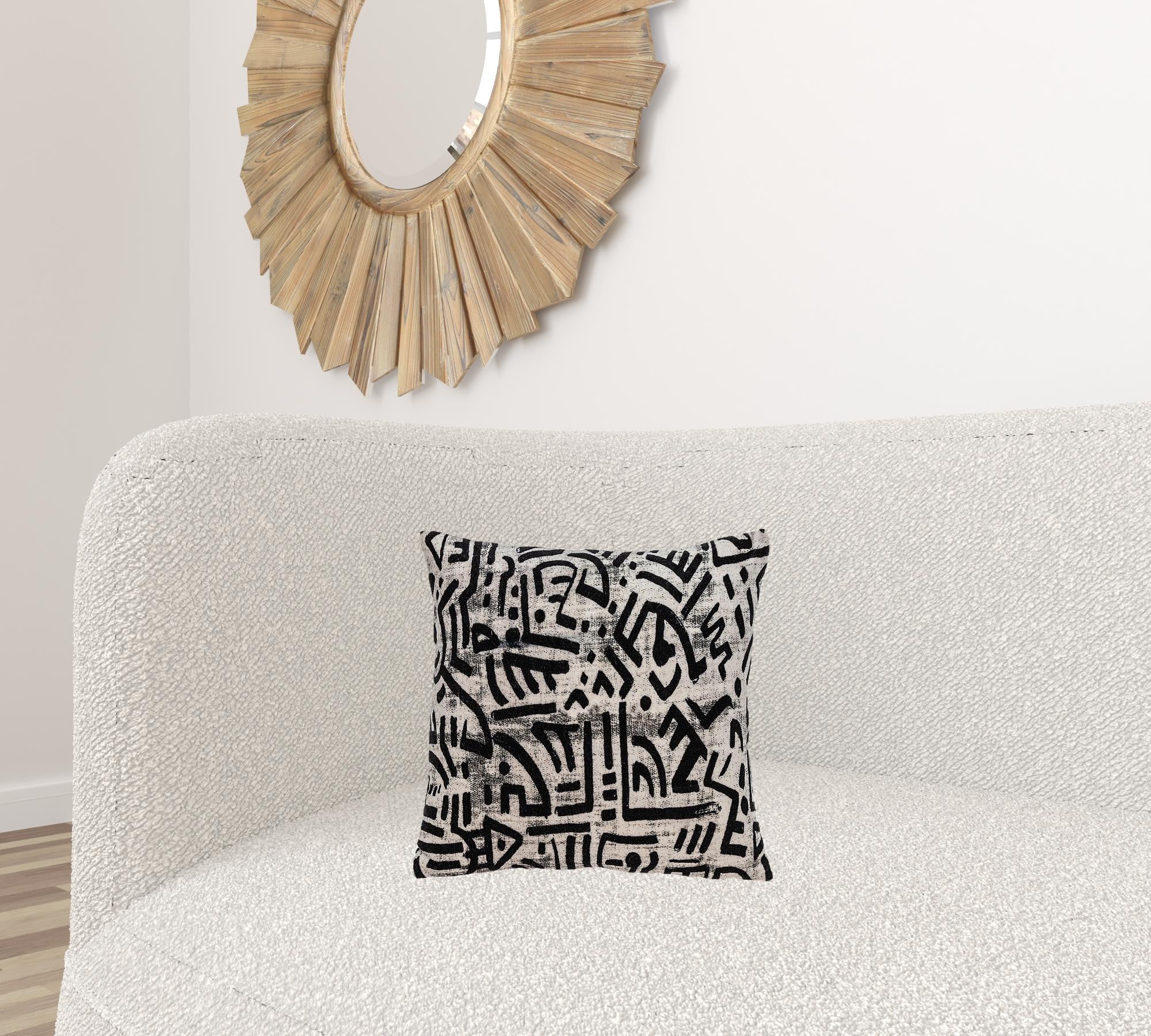 Black and white abstract velvet throw pillow with a modern design, featuring a soft velvet front and beige cotton canvas back.