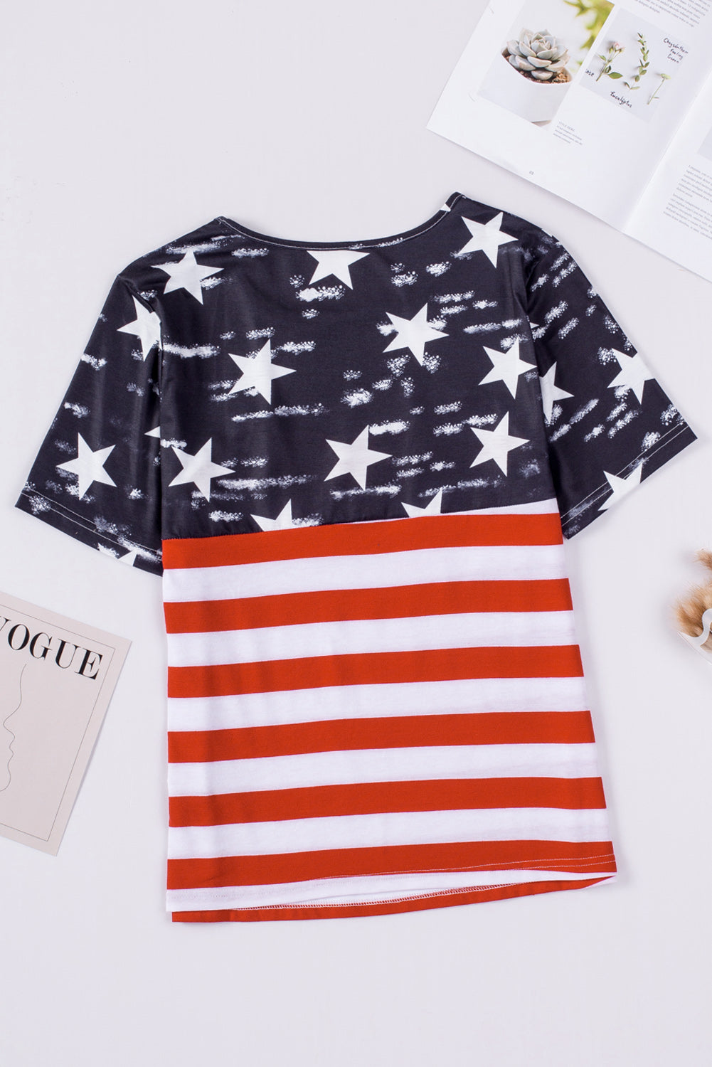 Black Contrast American Flag Cutout T-Shirt featuring a star and stripe print with a daring front cutout design.