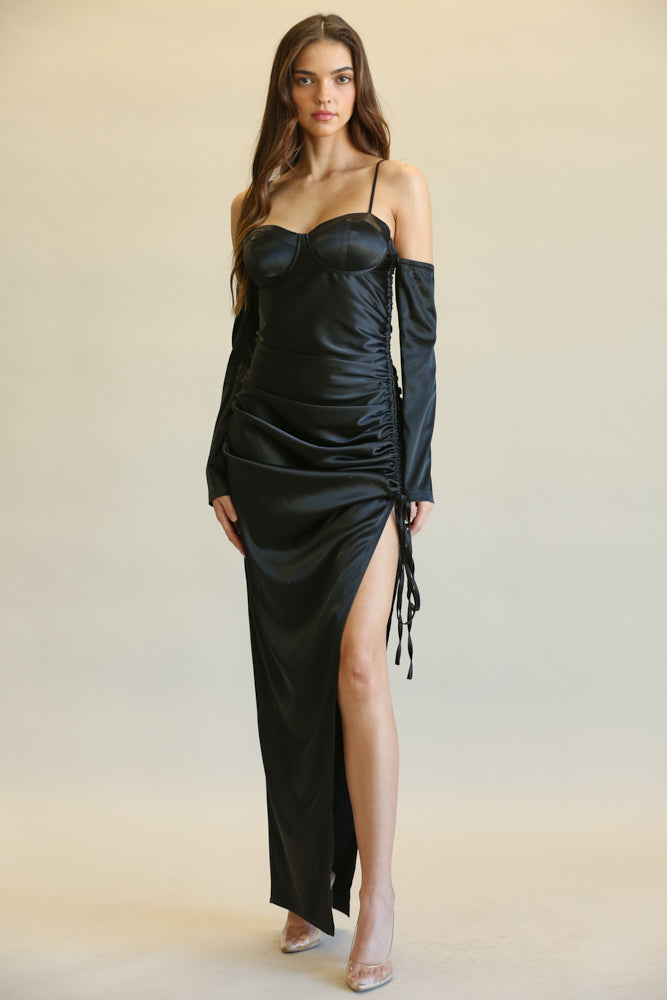 The Blake dress featuring off-shoulder sleeves, ruched side detail, and high leg slit in luxurious matte satin fabric.