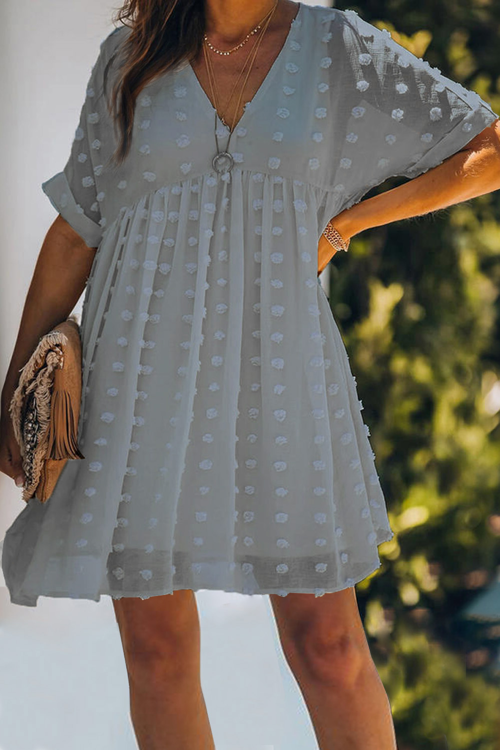 Woman in light blue dress.