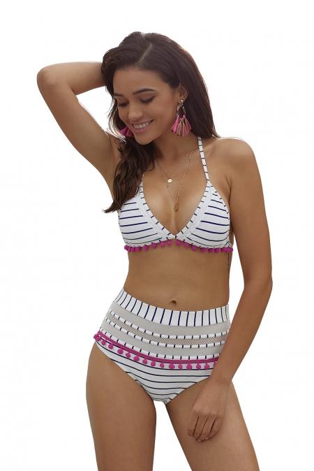 Blue and white striped high waist bikini with pom pom details and mesh inserts, perfect for summer beach outings.