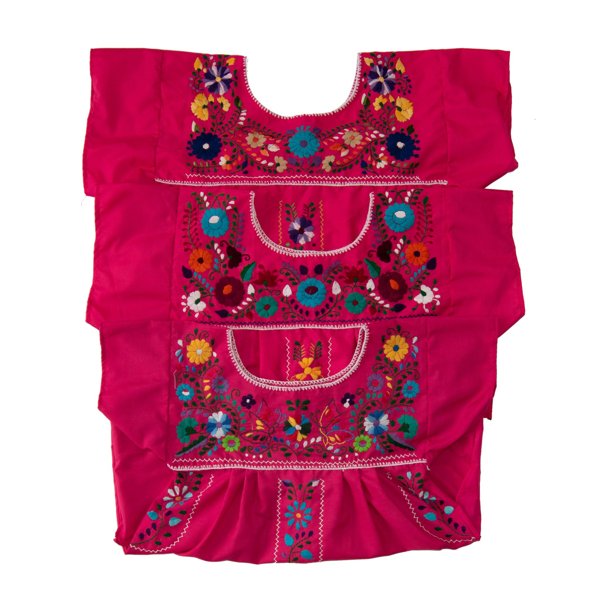 A beautiful Bohemian pink dress adorned with colorful floral embroidery, showcasing its unique handmade craftsmanship.