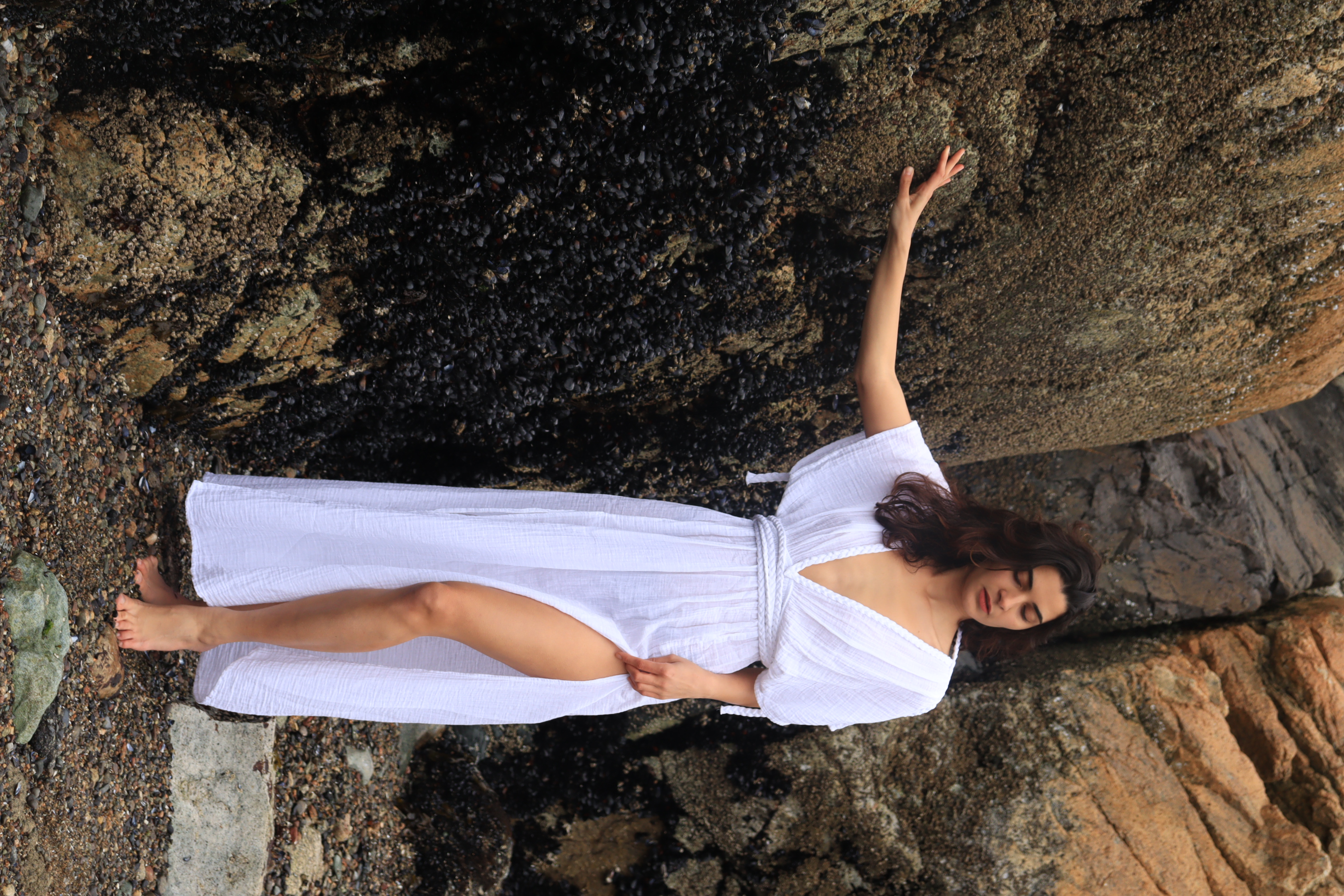 A beautiful Boho Cotton Slit Summer Maxi Dress displayed on a mannequin, showcasing its elegant design and soft fabric.