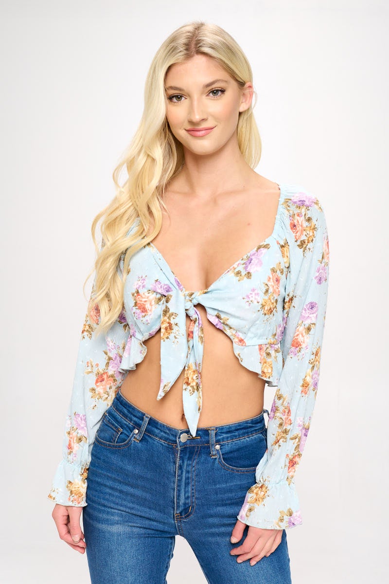 A stylish Boho Tie-Front Crop Top featuring ruffle details and long sleeves, perfect for casual outings.