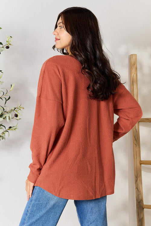 BOMBOM Drop Shoulder Long Sleeve Blouse with Pockets in a stylish design, showcasing its relaxed fit and soft fabric.