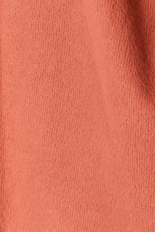 BOMBOM Drop Shoulder Long Sleeve Blouse with Pockets in a stylish design, showcasing its relaxed fit and soft fabric.