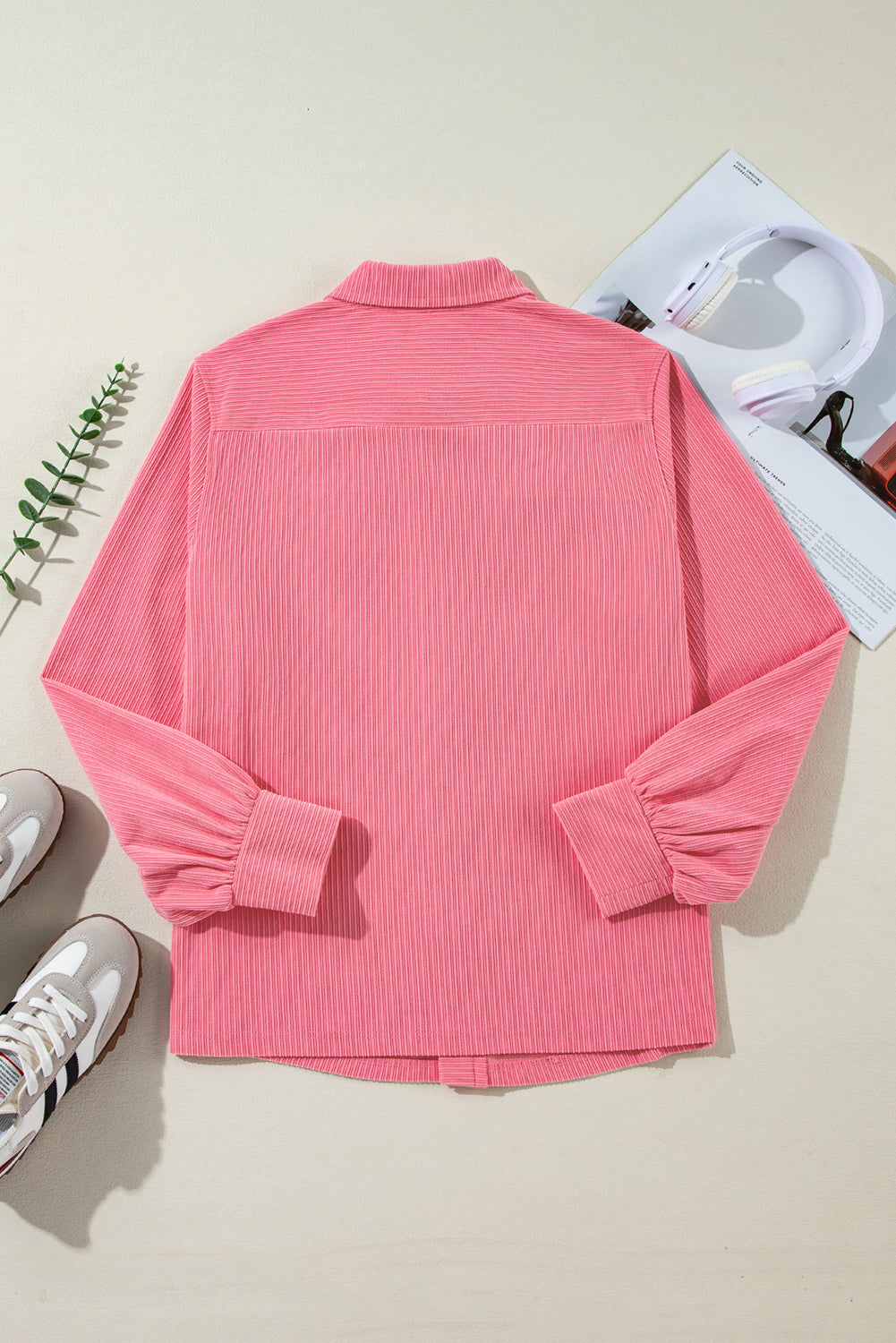 Bonbon Corduroy Button-Up Shacket featuring flap details and side splits, showcasing its stylish design and texture.