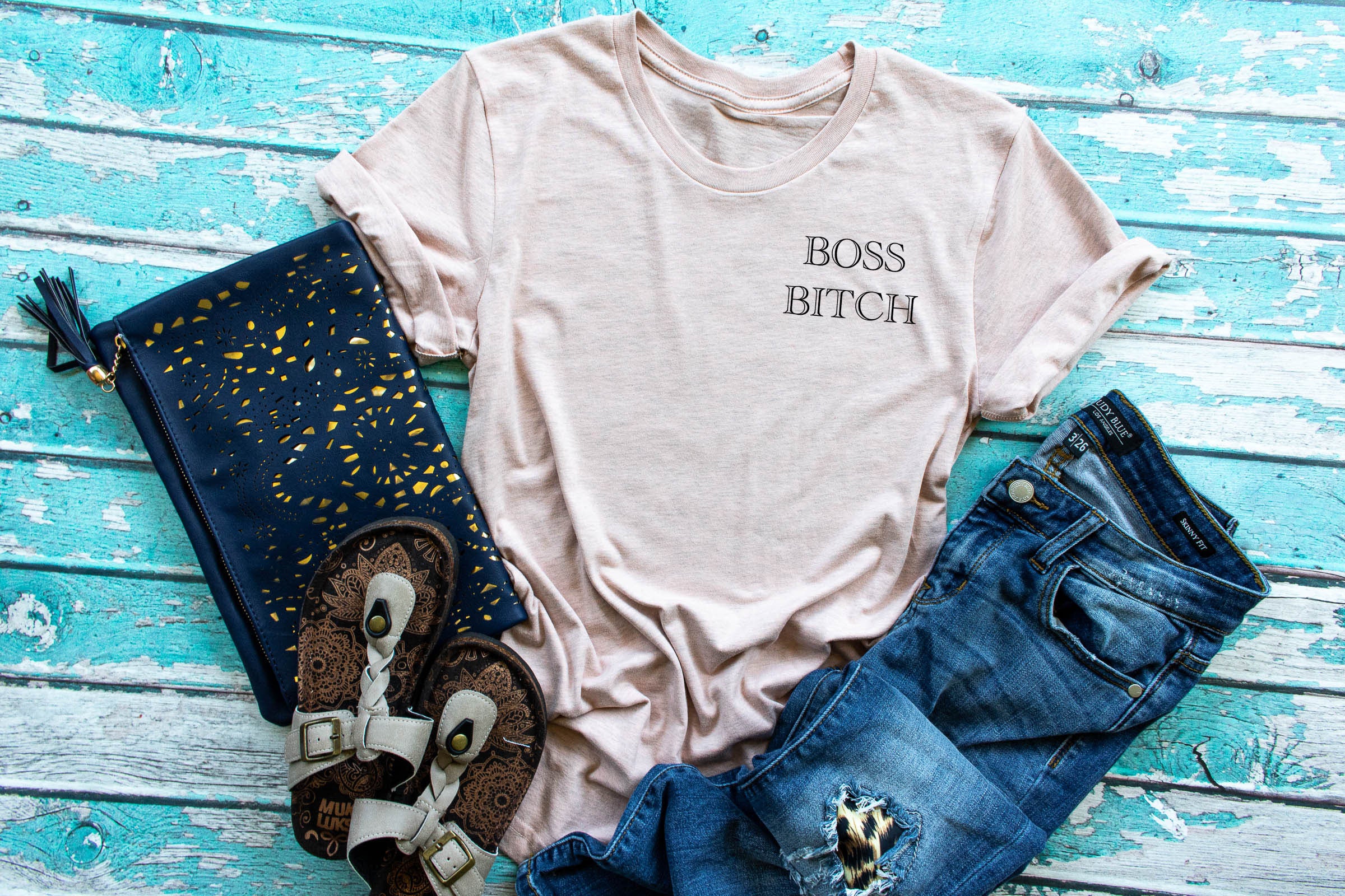 A stylish black Boss Bitch Tee and Tank showcasing confidence and empowerment.
