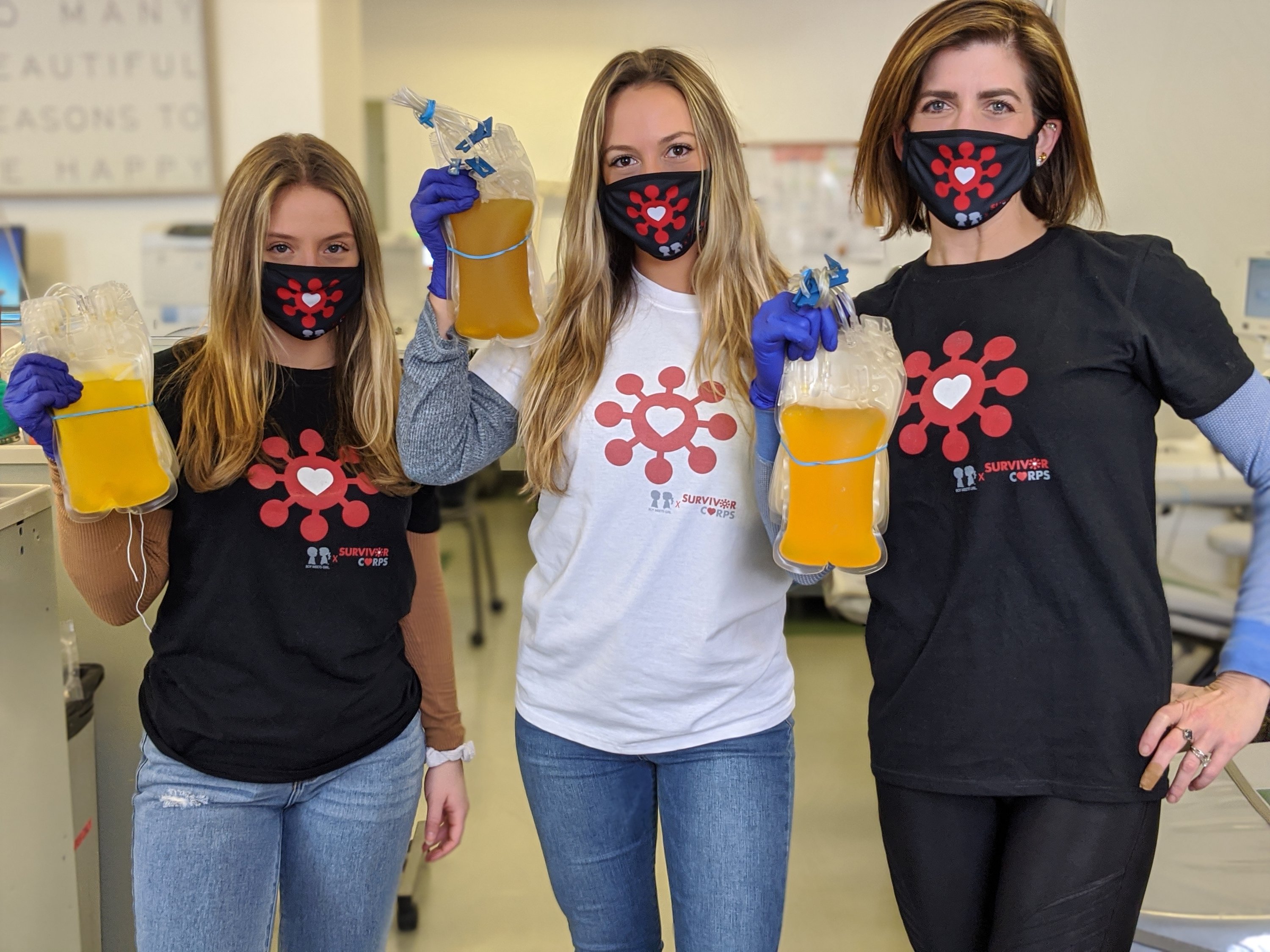 Black unisex t-shirt featuring BOY MEETS GIRL® x SURVIVOR CORPS logo, symbolizing support for COVID-19 survivors.
