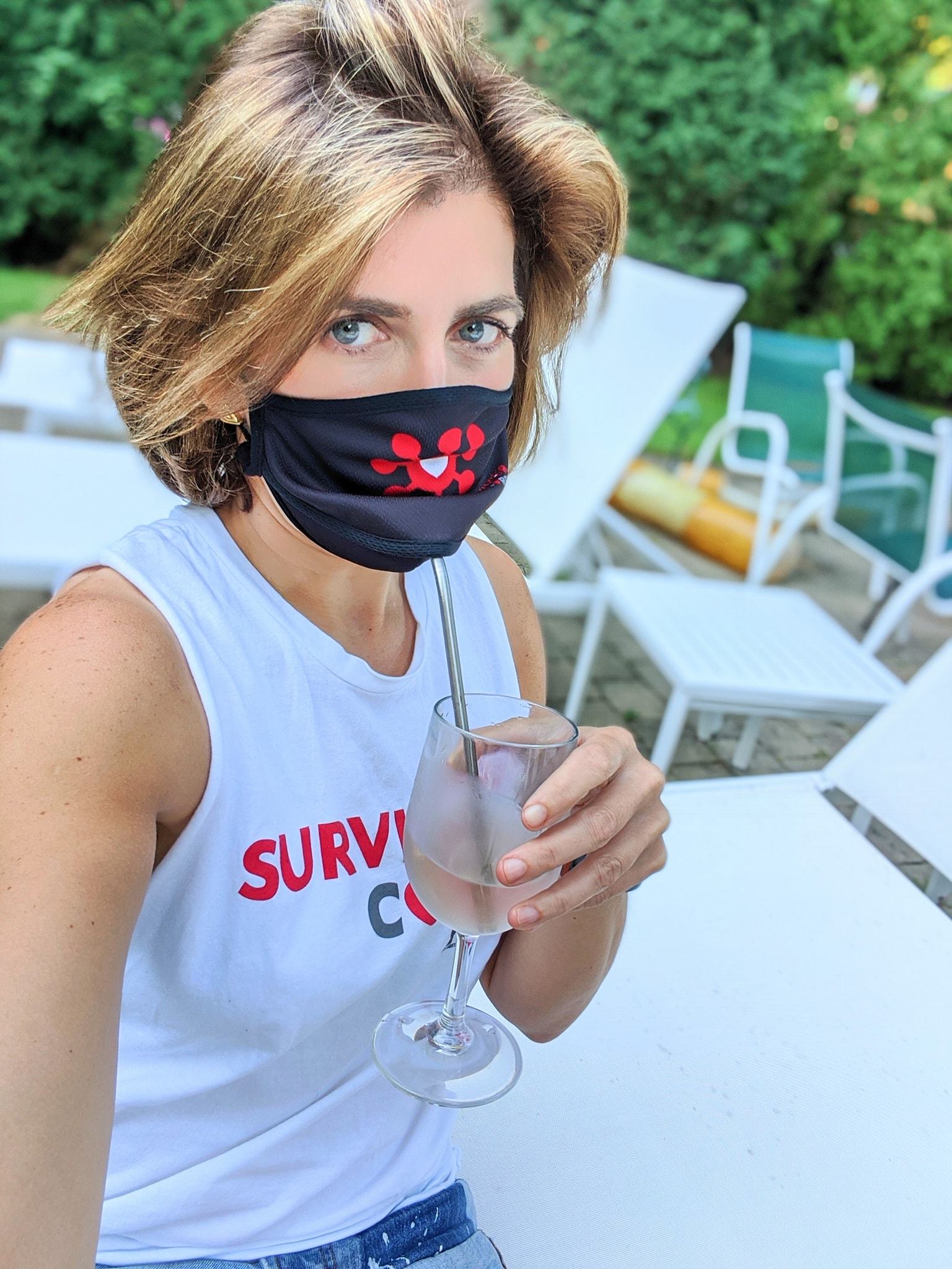 BOY MEETS GIRL® x SURVIVOR CORPS 'Dylan' Drinking Mask for kids, featuring a stylish design and adjustable elastic for comfort.
