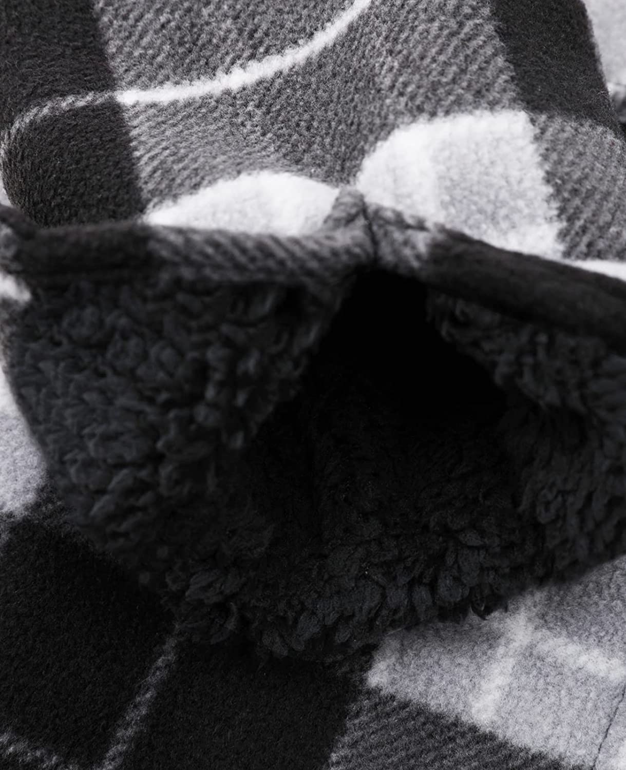 Boys Matching Family Fleece Black White Buffalo Plaid Shacket displayed on a hanger, showcasing its stylish plaid pattern and cozy fleece material.