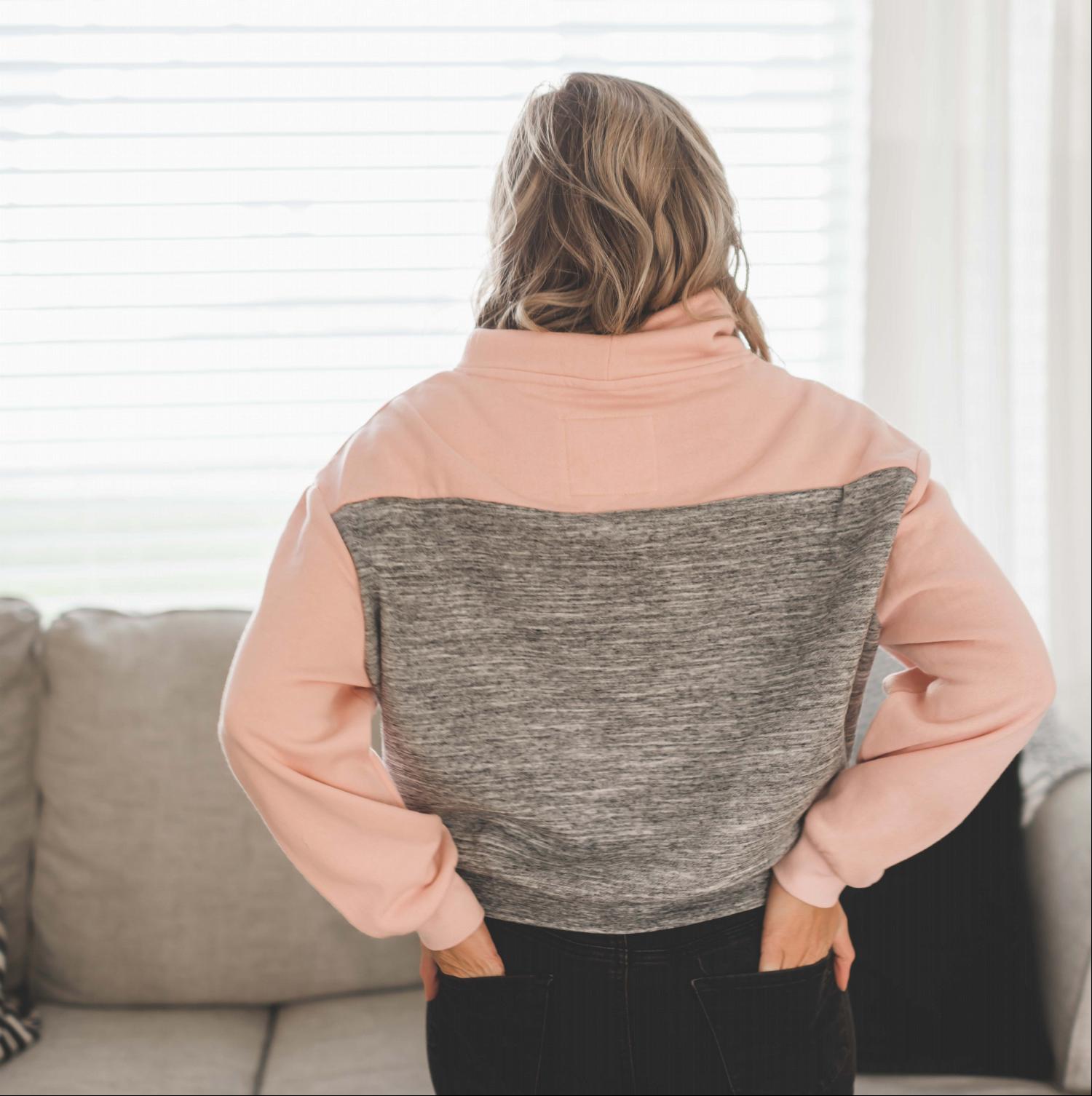 Brushed Cowl Neck Color Block Pullover showcasing a trendy color-block design with a high-neck drawstring and oversized fit.