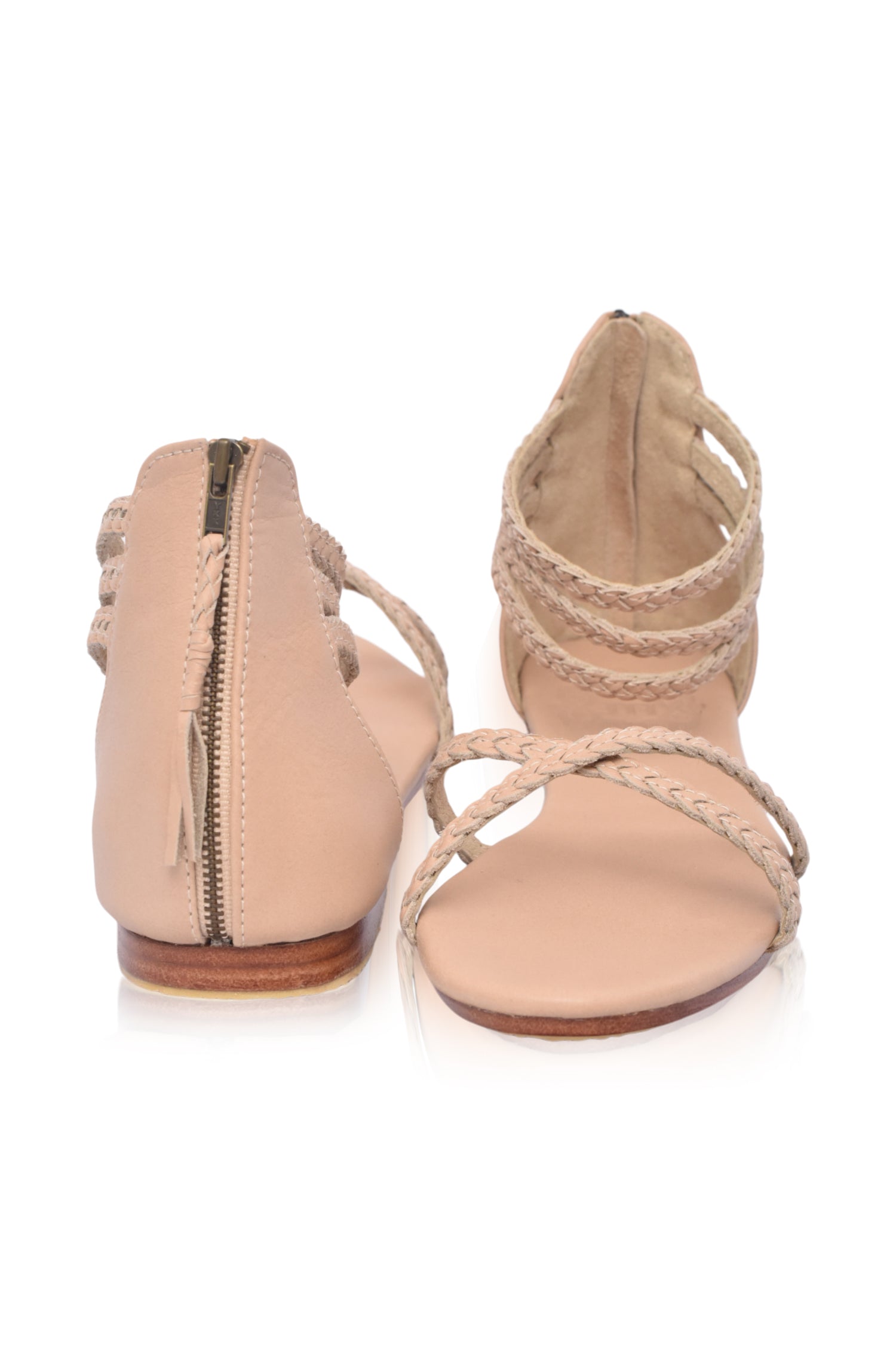 Calypso Braided Leather Sandals featuring braided leather straps and a zipper closure, perfect for summer wear.