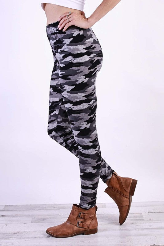 A pair of stylish camo soft leggings made from a comfortable polyester and spandex blend, showcasing a trendy camouflage pattern.