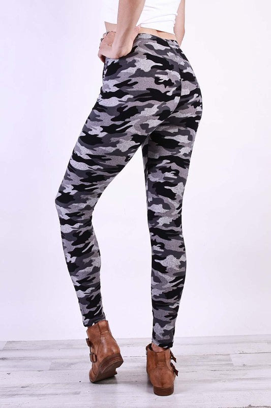 A pair of stylish camo soft leggings made from a comfortable polyester and spandex blend, showcasing a trendy camouflage pattern.